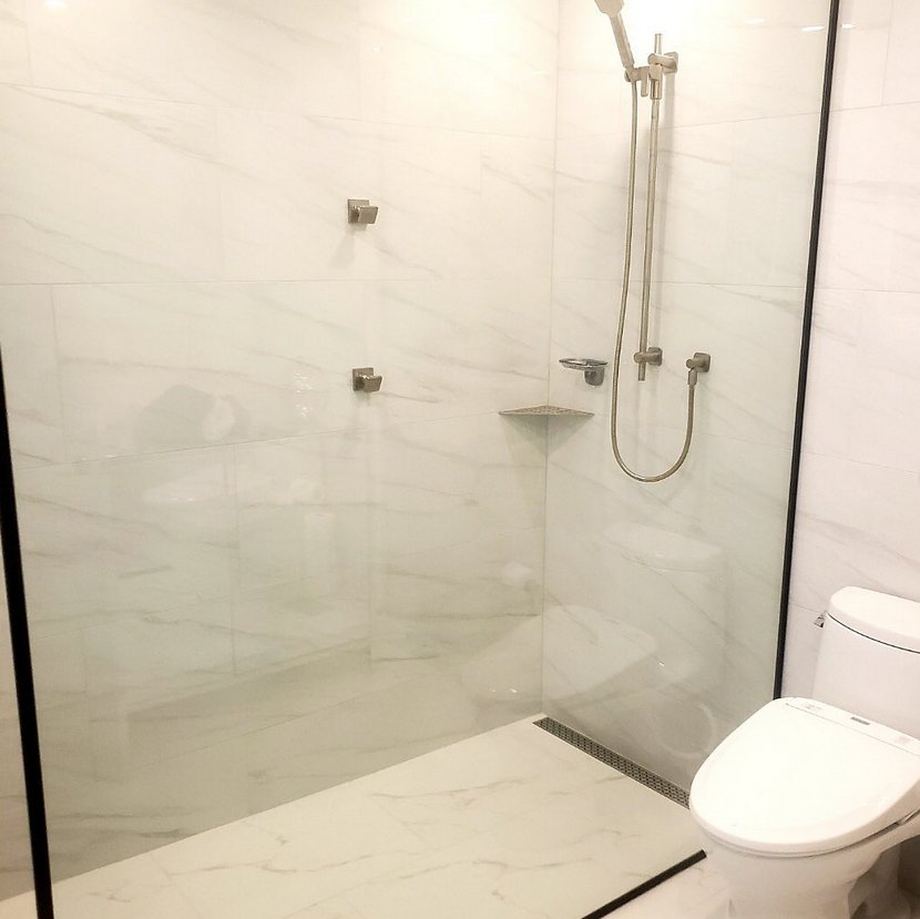 Leaks Plumbing — marble walk-in shower renovation